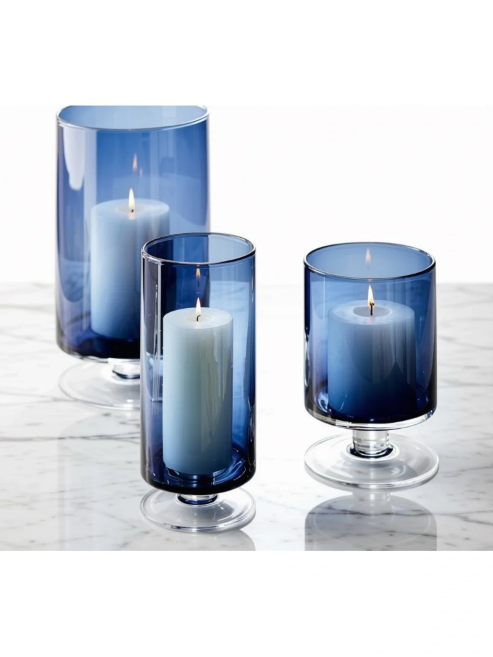 Crate & Barrel Blue Glass Pedestal Hurricane Set